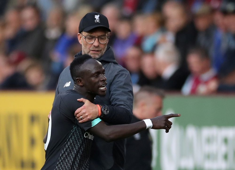 Liverpoolu00e2u20acu2122s Sadio Mane reacts after being substituted off as manager Juergen Klopp looks on during their Premier League match against Burnley at Turf Moor, Burnley, August 31, 2019. u00e2u20acu201d Action Images via Reuters