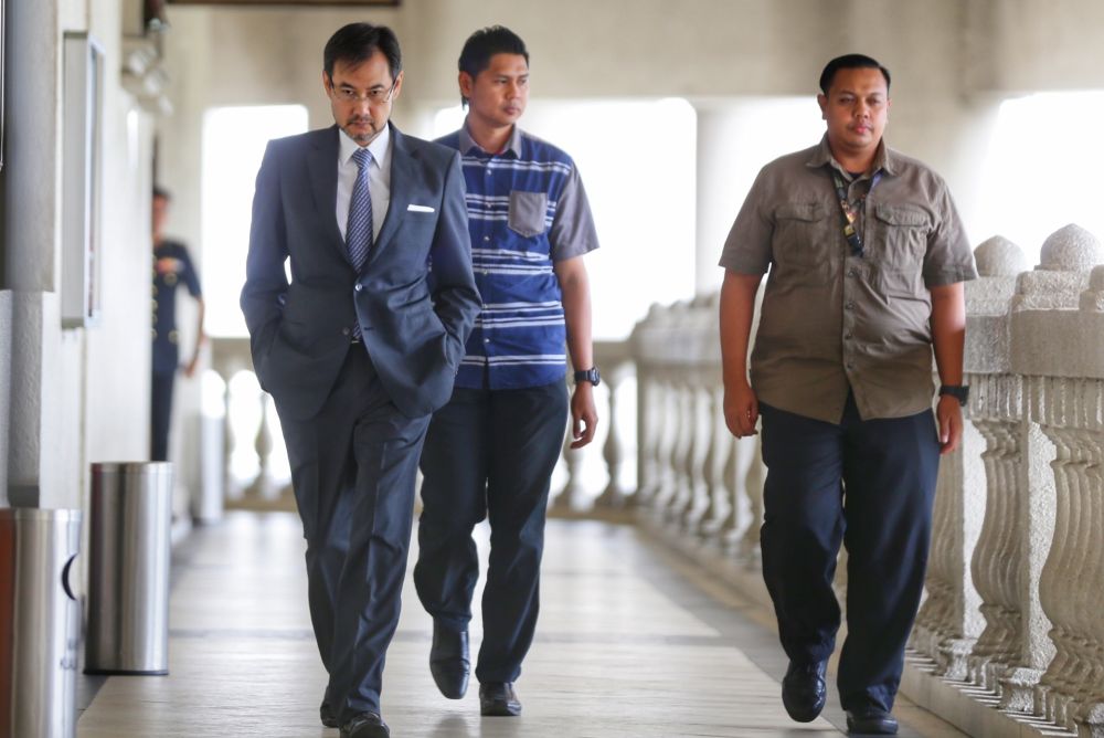 Former 1MDB CEO Datuk Shahrol Azral Ibrahim Halmi (left) is pictured at the Kuala Lumpur Court Complex September 30, 2019. u00e2u20acu2022 Picture by Ahmad Zamzahuri