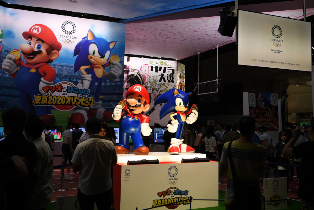 Characters of Nintendou00e2u20acu2122s franchise Mario and Segau00e2u20acu2122s Sonic the Hedgehog are seen at a promotional booth for the video game u00e2u20acu02dcMario & Sonic at the Olympic Games Tokyo 2020u00e2u20acu2122 during the Tokyo Game Show in Makuhari, Chiba Prefecture on September 12, 201