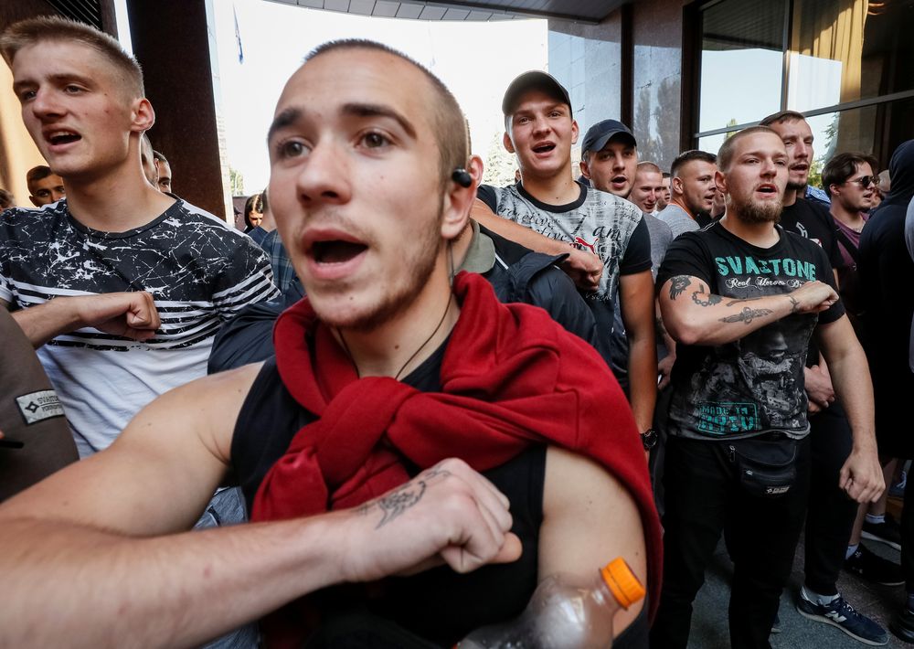 Activists of Ukrainian nationalist groups shout slogans during a protest against a court decision to release on bail Volodymyr Tsemakh, suspected of involvement in the downing of the Malaysia Airlines flight MH17 plane in 2014, in Kiev, Ukraine September 