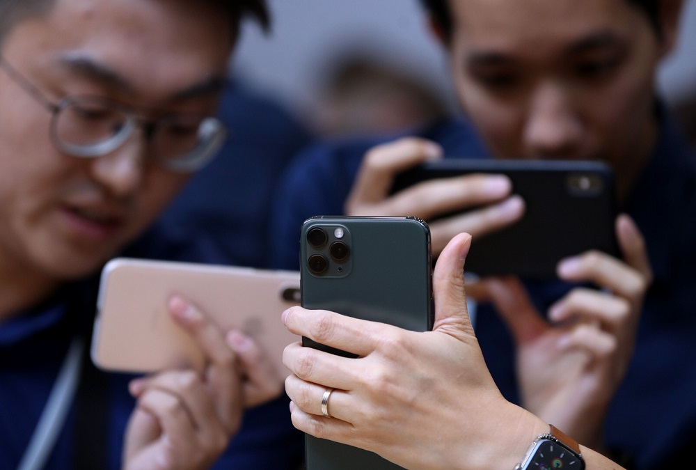Attendees look at the new Apple iPhone 11 Pro during an Apple special event on September 10, 2019 in Cupertino, California September 10, 2019. u00e2u20acu201d AFP pic