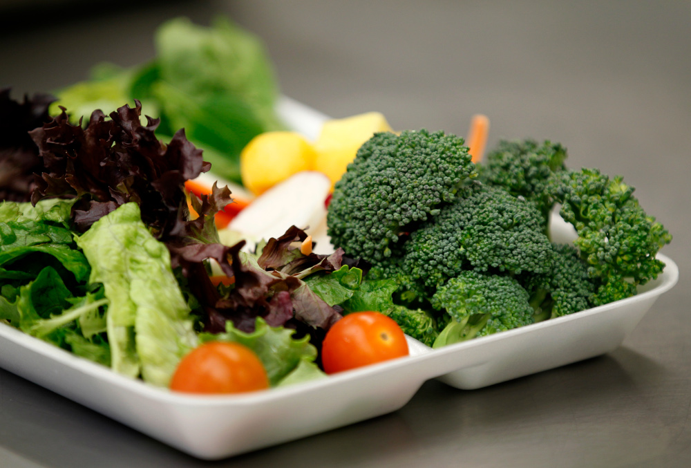 Some of more than 3,630kg of locally grown broccoli from a partnership between Farm to School and Healthy School Meals is served in a salad to students at Marston Middle School in San Diego, California, March 7, 2011. u00e2u20acu201d Reuters pic  