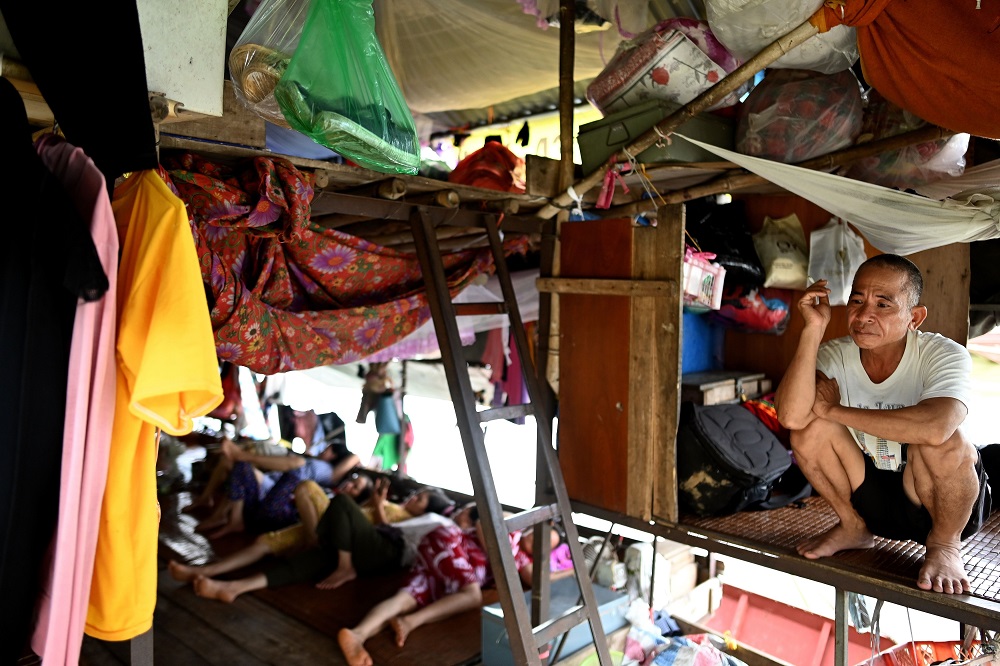This photograph taken on September 8, 2019 shows Han Van Hoa, a Vietnamese migrant worker living for the past 10 years in the floating guesthouse along the banks of the Red River in Hanoi. u00e2u20acu201d AFP pic       