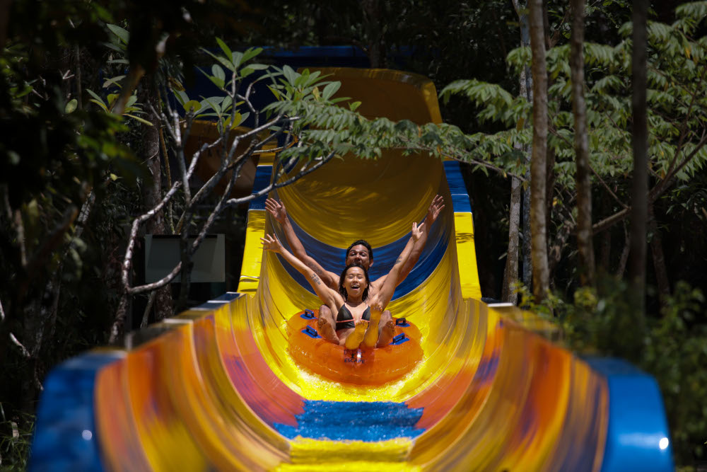 Theme park patrons slide down on a floater on the worldu00e2u20acu2122s longest water slide at Escape theme park in Teluk Bahang, Malaysia September 25, 2019. u00e2u20acu201d AFP pic 