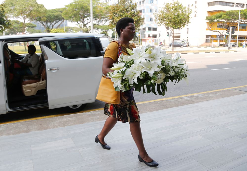 A visitor arrives with a wreath at funeral parlour Singapore Casket, where the body of late former Zimbabweu00e2u20acu2122s President Robert Mugabe is being held in Singapore September 7, 2019.  u00e2u20acu201d Reuters pic
