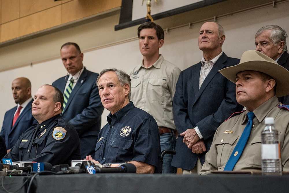 Texas Governor Greg Abbott (front, centre) furing a press conference at the University of Texas of the Permian Basin (UTPB) following a deadly shooting spree in Odessa September 1, 2019. u00e2u20acu201d AFP pic 
