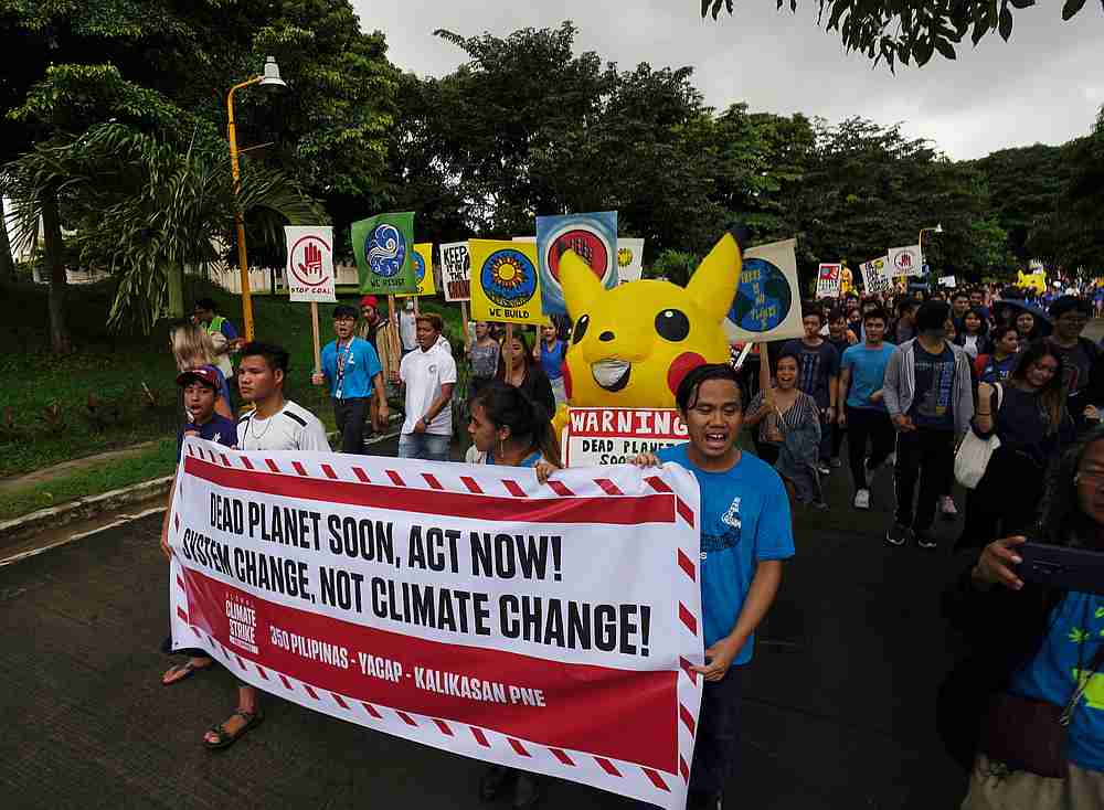 University students and activists wear costumes and carry placards as they join the global action for Climate Change, in Manila, Philippines September 20, 2019. u00e2u20acu201d Reuters pic 