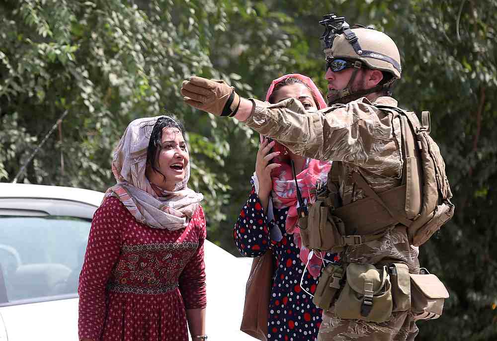 Women talk with a security force officer as they look for their relatives at the site of a suicide attack in Kabul, Afghanistan September 5, 2019. u00e2u20acu201d Reuters pic