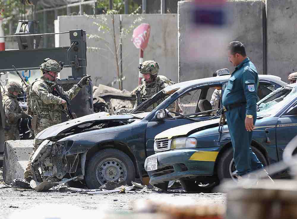 Foreign troops with Nato-led Resolute Support Mission investigate at the site of a suicide attack in Kabul, Afghanistan September 5, 2019. u00e2u20acu201d Reuters pic