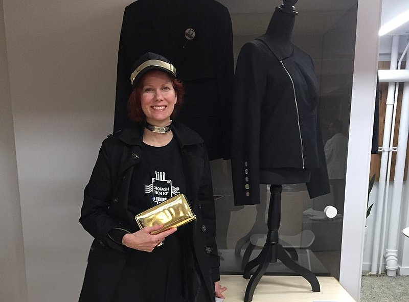 Anina Trepte, founder and CEO of 360Fashion Network, poses in the Robotic Dress Exhibition in New York, next to one of her inventions, a robot that prepares cocktails September 9, 2019. u00e2u20acu201d AFP pic