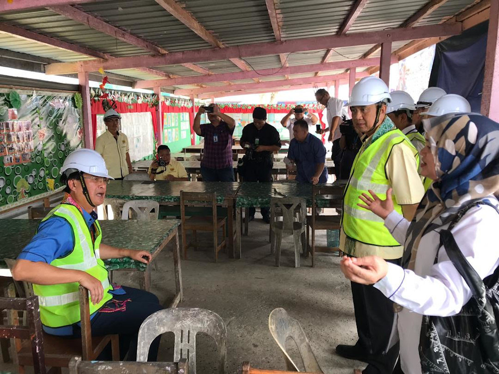 Works Minister Baru Bian is seen seated on a chair in a classroom of SK Bandar Bintangor in Bintangor September 15, 2019. u00e2u20acu201d Picture courtesy of Works Ministry