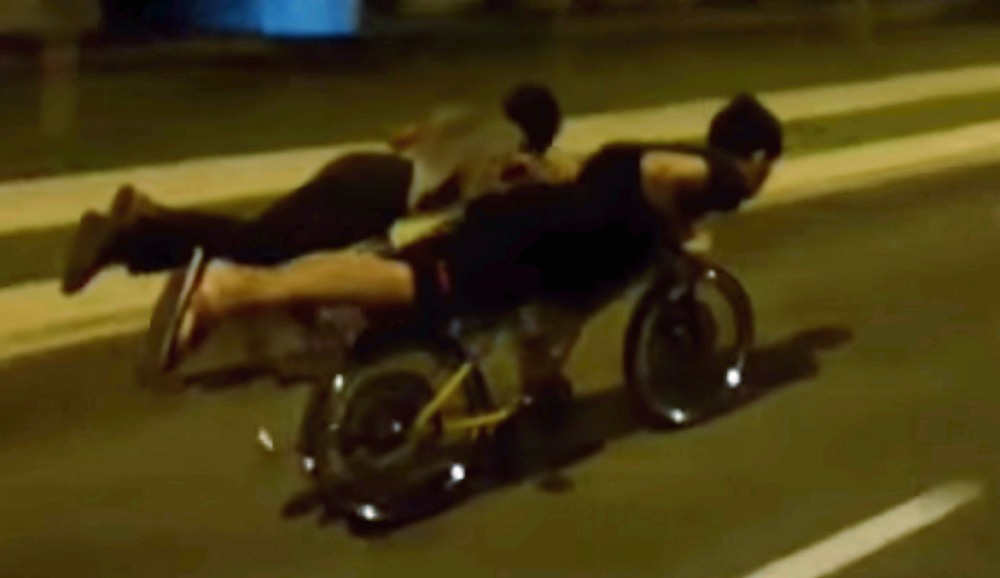 For reasons unknown, many young kids try to show off their riding prowess as they glide on highways doing a u00e2u20acu02dcSupermanu00e2u20acu2122 pose on their bicycles. u00e2u20acu2022 Screengrab via YouTube