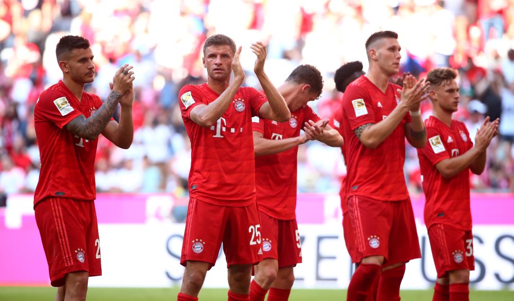 Bayern Munich's Thomas Muller (second from left) and team mates applaud fans after the match against FSV Mainz 05. u00e2u20acu201d Reuters pic