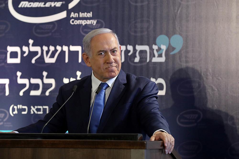 Israeli Prime Minister Benjamin Netanyahu speaks during a cornerstone-laying ceremony for Mobileye's centre in Jerusalem August 27, 2019. u00e2u20acu201d Abir Sultan/Pool pic via Reuters