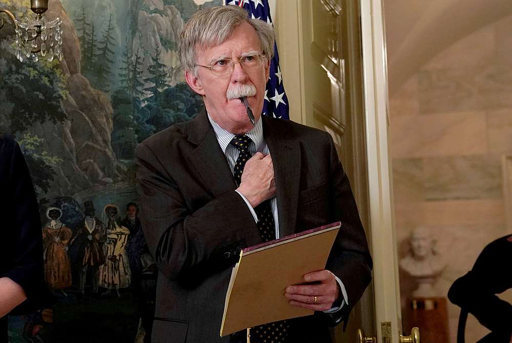 National Security Adviser John Bolton listens to US President Donald Trump's statement on Syria at the White House in Washington April 13, 2018. u00e2u20acu201d Reuters pic