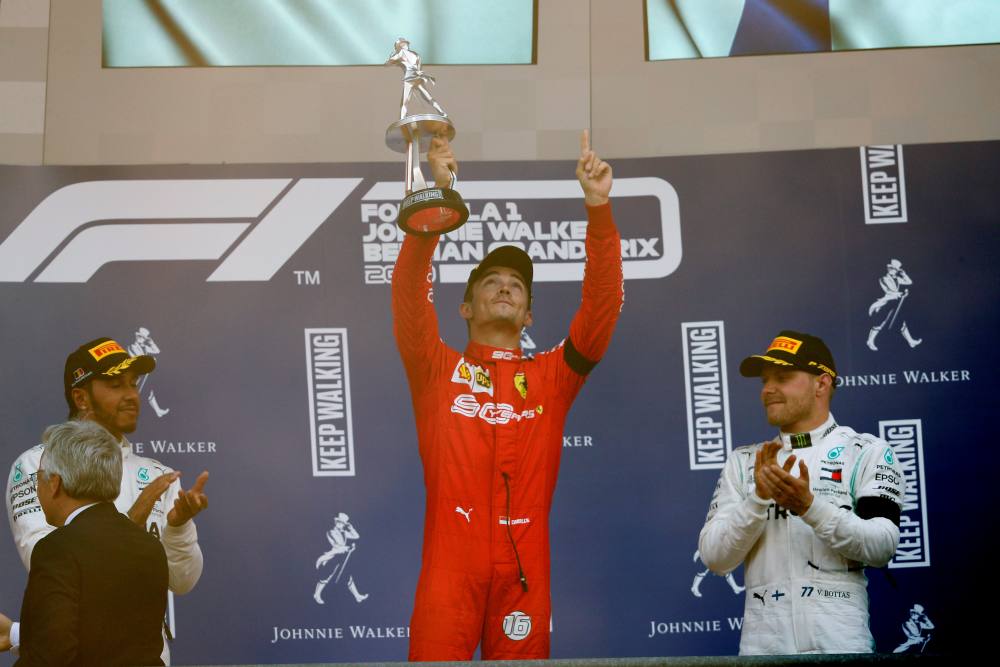 Ferrari's Charles Leclerc celebrates with the trophy on the podium after winning the Belgian Grand Prix, September 1, 2019. u00e2u20acu2022 Reuters pic