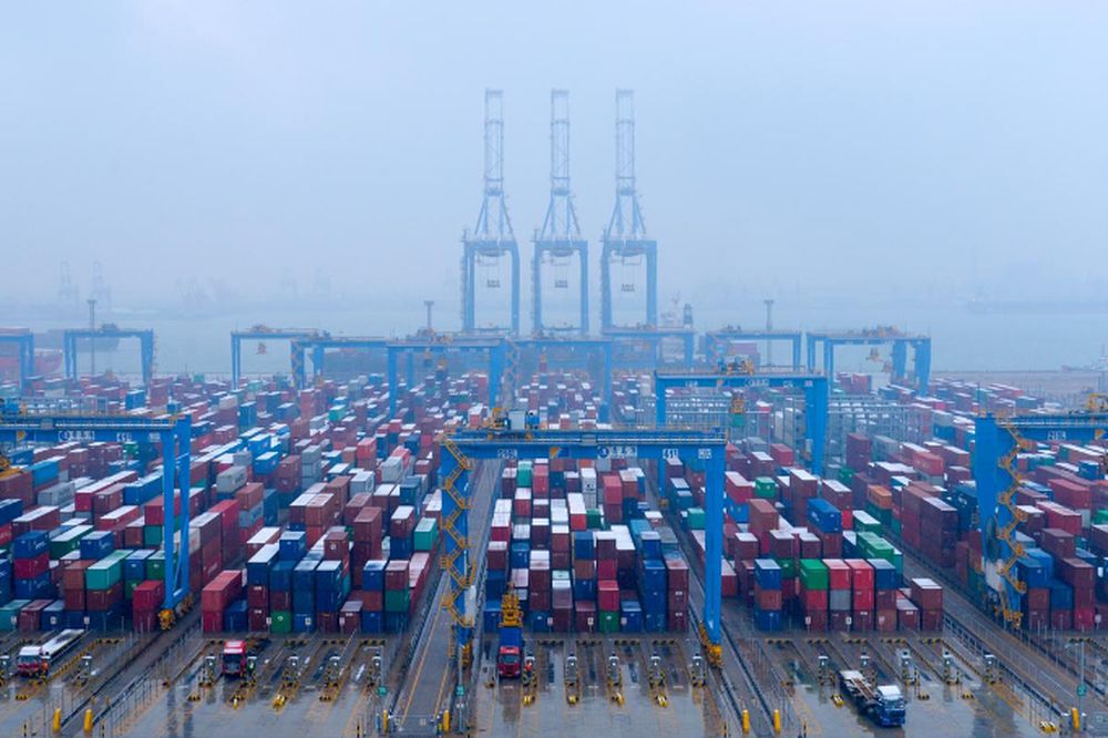 Containers and trucks are seen on a snowy day at an automated container terminal in Qingdao port, Shandong province, China, December 10, 2018. u00e2u20acu201d Reuters pic