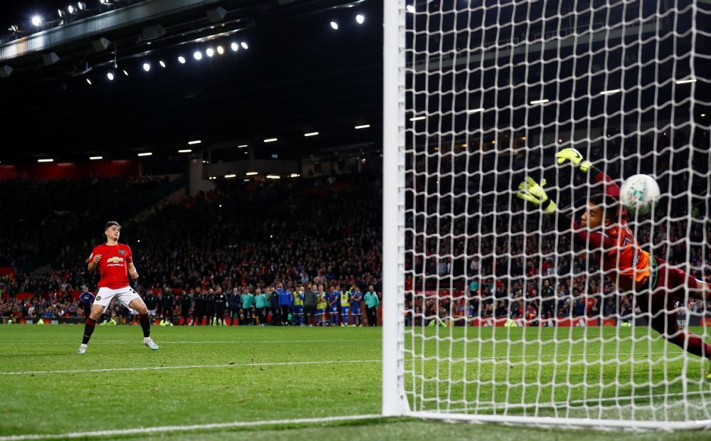 Manchester United's Daniel James scores the decisive penalty against Rochdale. u00e2u20acu201d Reuters pic