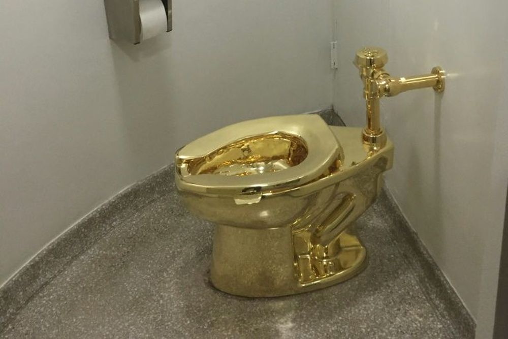 Maurizio Cattelanu00e2u20acu2122s fully functioning solid gold toilet, worth around US$5-6 million, only went on display last Thursday at Blenheim Palace and there are fears the thief may melt it down. u00e2u20acu201d AFP pic