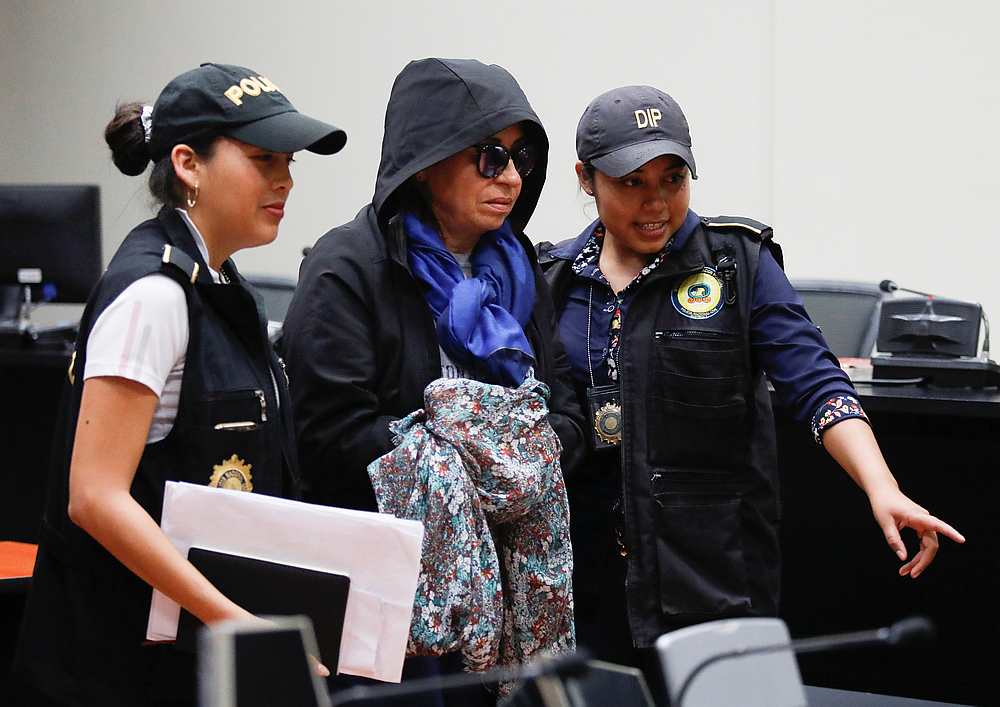 Policemen escort Sandra Torres, former first lady and presidential candidate of the National Unity of Hope (UNE) political party, after a hearing in Guatemala City September 2, 2019.  u00e2u20acu201d Reuters pic