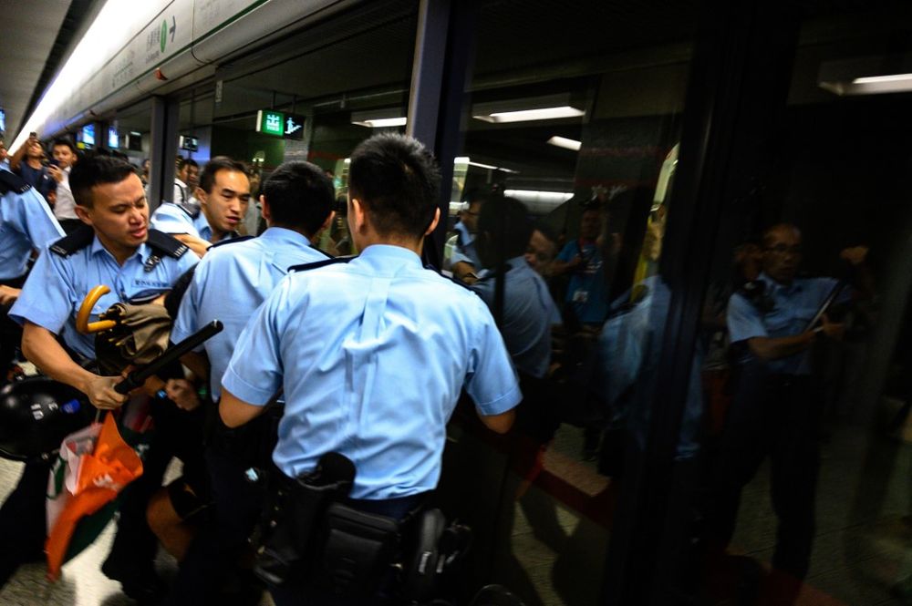 A man is arrested at the Lok Fu MTR station during a train disruption protest in Hong Kong on September 2, 2019. Hong Kong pro-democracy protesters threw morning rush hour train travel into chaos, kicking off another day of potential turmoil. u00e2u20acu201d AFP pic