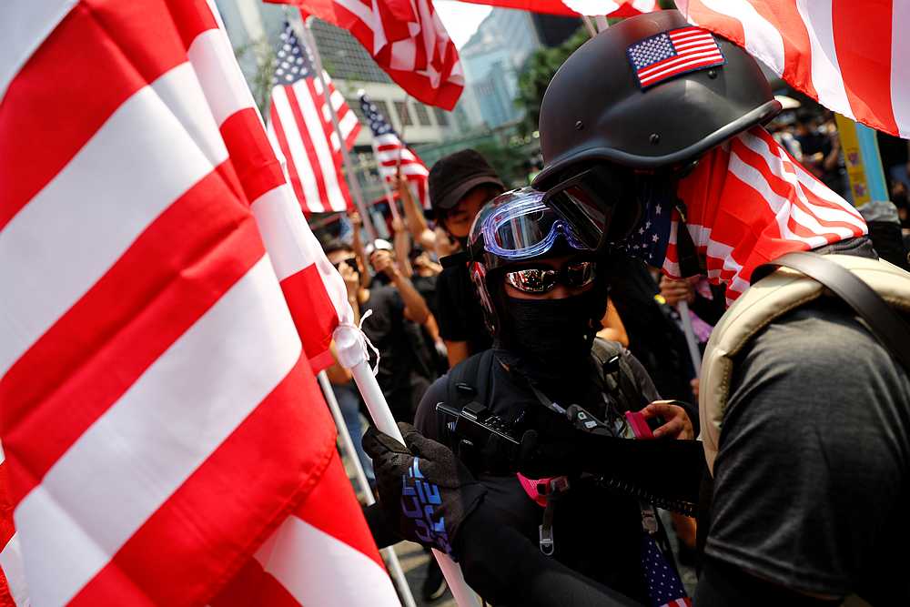 Protesters hold US flags in Central, Hong Kong, September 8, 2019. u00e2u20acu201d Reuters pic