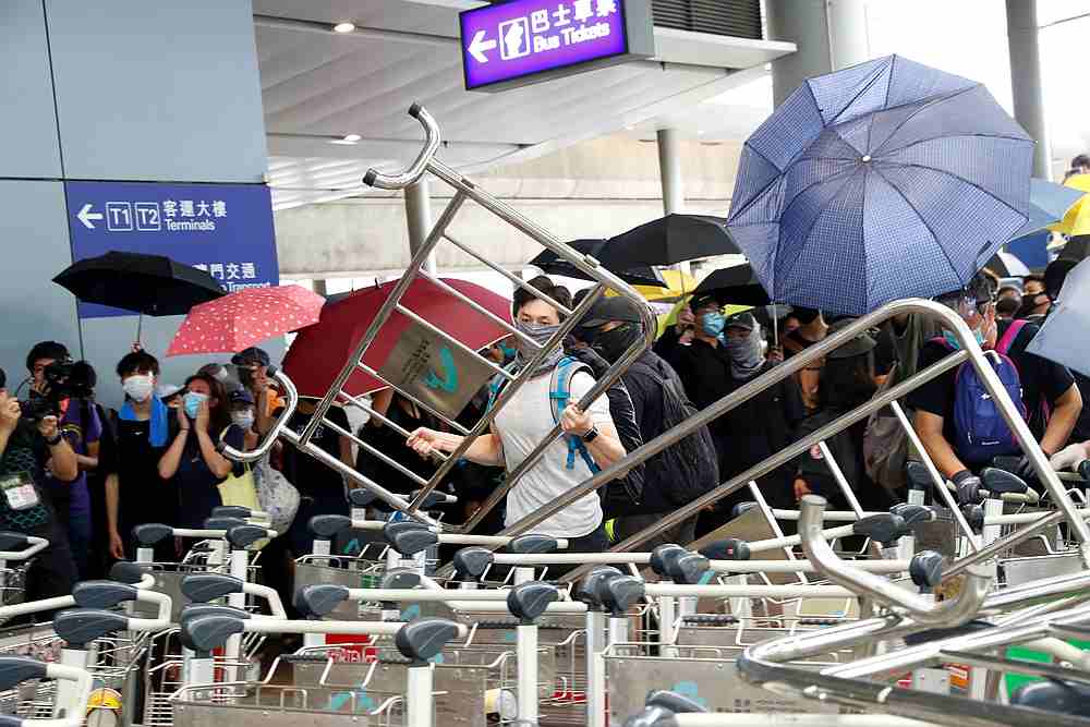 Protesters build barricades outside terminals at Hong Kong International Airport September 1, 2019. u00e2u20acu201d Reuters pic