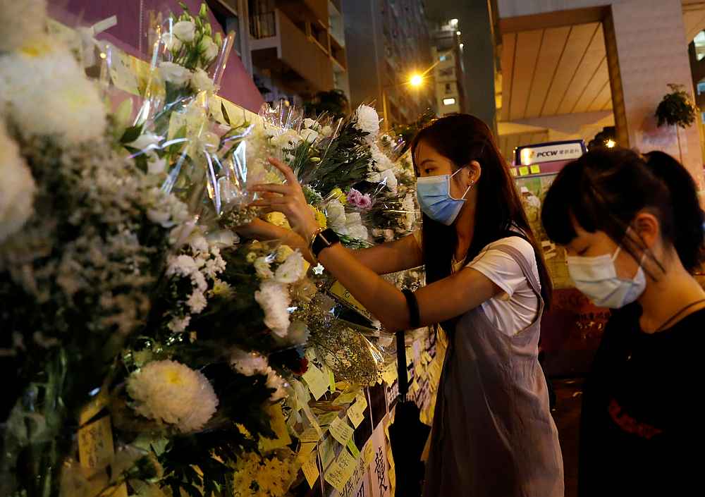Women pay their respects to the protesters who were injured during clashes with the police by placing flowers outside Prince Edward station, in Hong Kong September 4, 2019. u00e2u20acu201d Reuters pic