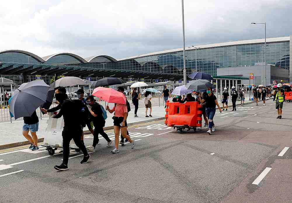 Protesters build barricades outside the terminals at Hong Kong International Airport, in Hong Kong September 1, 2019. u00e2u20acu201d Reuters pic