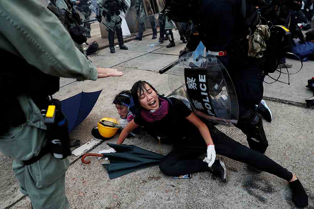 Riot police officers detain anti-government protesters during a demonstration at Admiralty district in Hong Kong September 29, 2019. u00e2u20acu201d Reuters pic