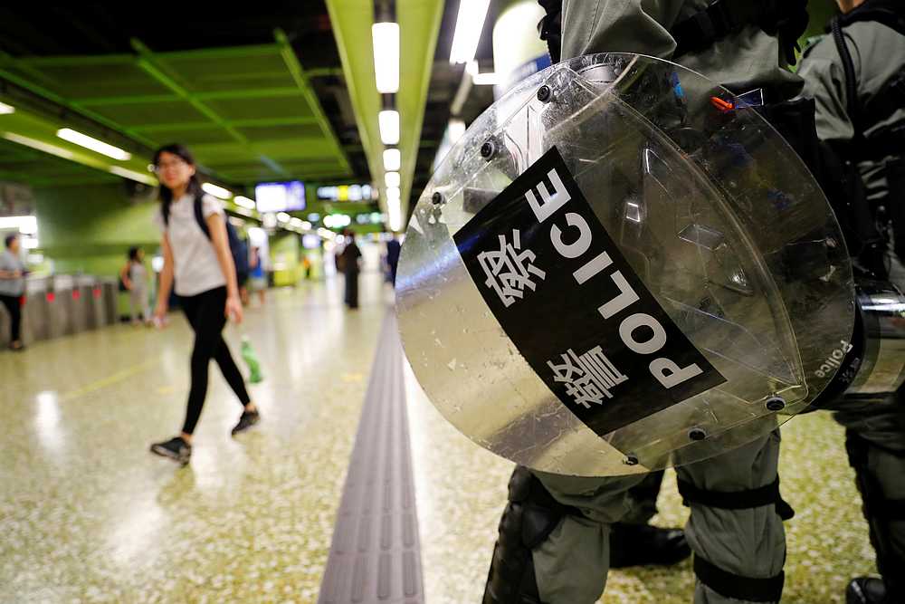 A riot police holds his shield at a Mass Transit Railway (MTR) station in Hong Kong September 2, 2019.  u00e2u20acu201d Reuters pic