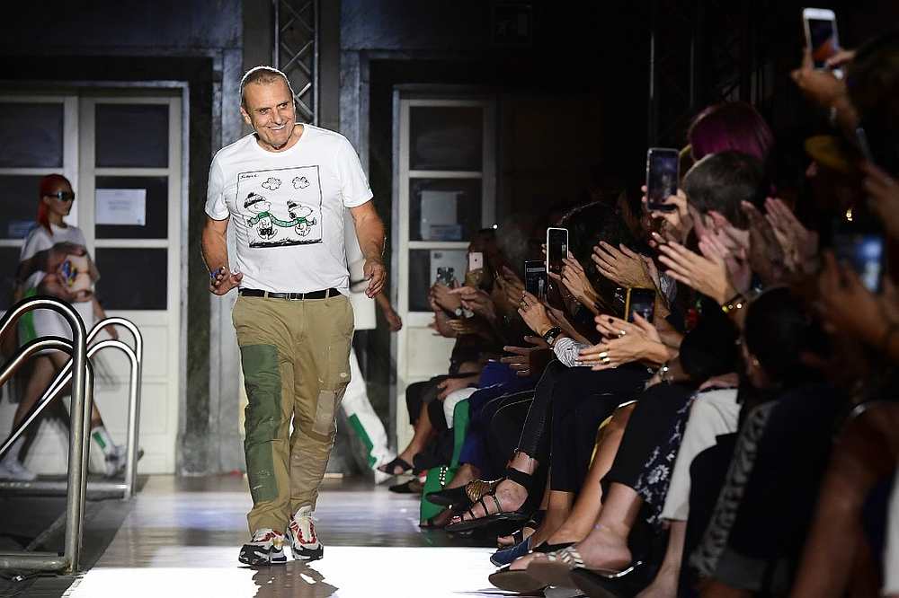 French designer Jean-Charles de Castelbajac, artistic director of Italian fashion house Benetton, smiles at the audience at the end of the Benetton Women's Spring-Summer 2020 show in Milan September 17, 2019. u00e2u20acu201d AFP pic