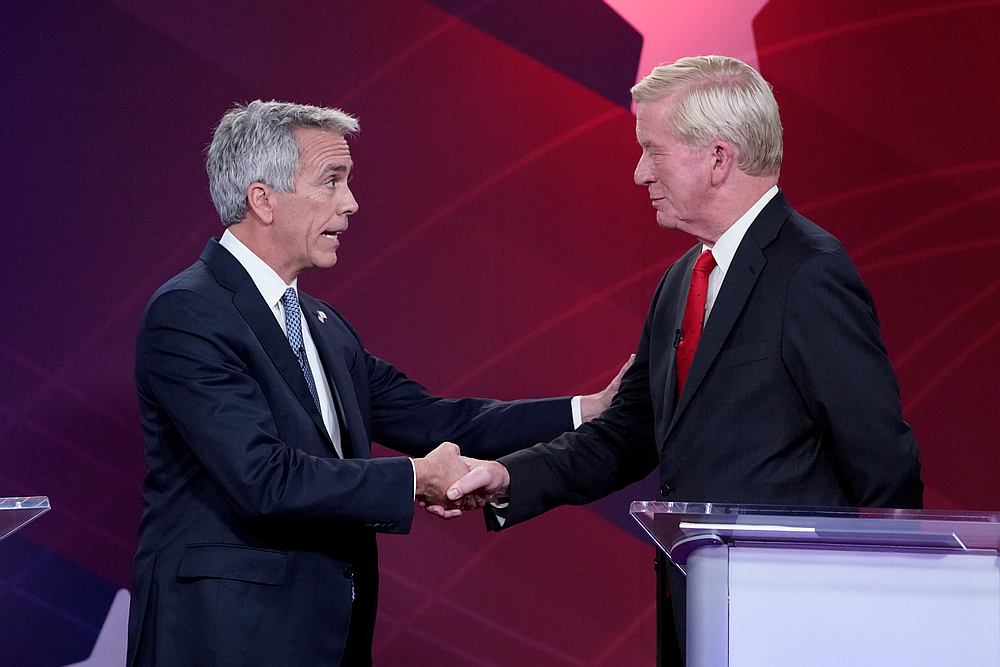 2020 Republican US presidential candidates, former US congressman Joe Walsh (left) and former Massachusetts Governor Bill Weld shake hands at the start of a debate in New York September 24, 2019. u00e2u20acu201d Reuters pic