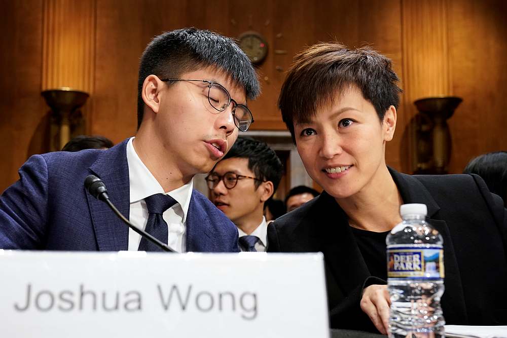 Joshua Wong speaks with Denise Ho, a pro-democracy activist, before testifying at a Congressional-Executive Commission on China (CECC) hearing on Capitol Hill in Washington September 17, 2019. u00e2u20acu201d Reuters pic