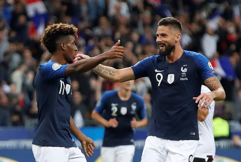 France's Kingsley Coman (left) celebrates with Olivier Giroud after scoring the third goal against Albania September 7, 2019. u00e2u20acu2022 Reuters pic