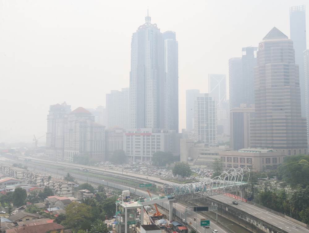 A thick blanket of haze shrouds Kuala Lumpur city centre, September 10, 2019. u00e2u20acu201d Picture by Firdaus Latif