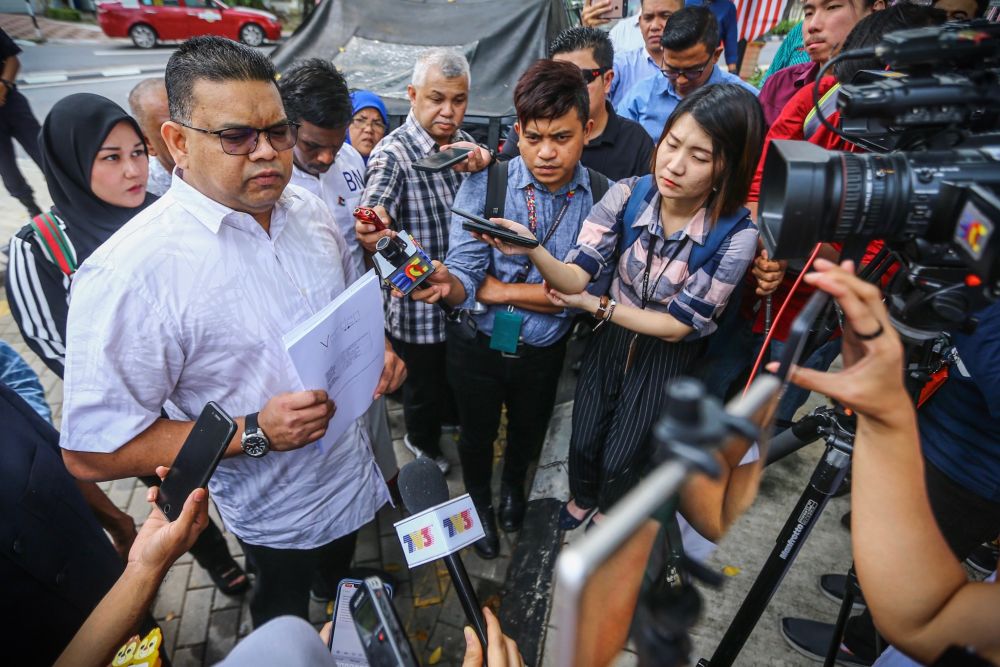 Datuk Lokman Noor Adam speaks to reporters outside the Bukit Aman police headquarters September 3, 2019.  u00e2u20acu201d Picture by Hari Anggara