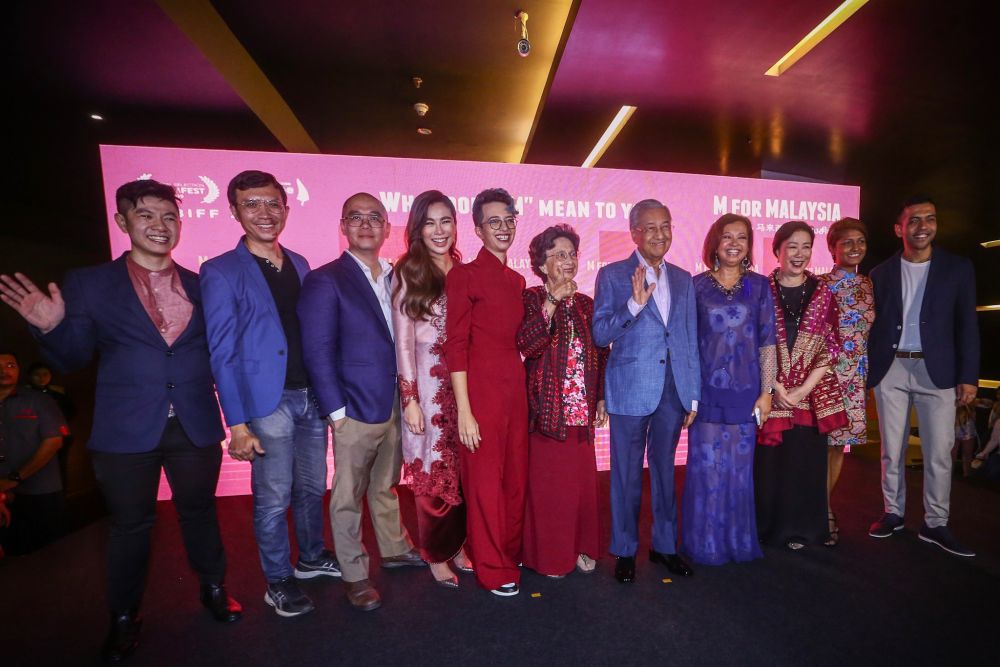 Prime Minister Tun Dr Mahathir Mohamad and Tun Dr Siti Hasmah Mohd Ali pose for a group picture with the production team of u00e2u20acu02dcM for Malaysiau00e2u20acu2122 during its premiere at GSC Pavilion, Kuala Lumpur September 10, 2019. u00e2u20acu201d Picture by Hari Anggara