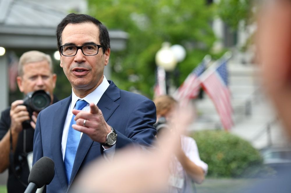 US Treasury Secretary Steven Mnuchin (left) answers journalists questions outside the White House on September 09, 2019. u00e2u20acu201d AFP pic