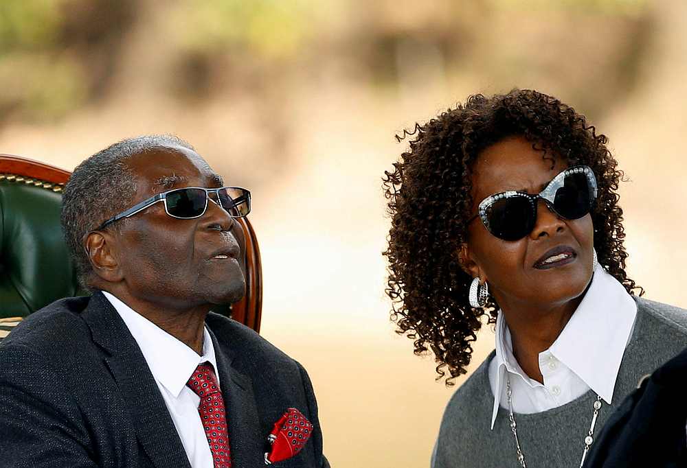 Zimbabwe's former president Robert Mugabe and his wife Grace look on after addressing a news conference at his private residence nicknamed 'Blue Roof' in Harare, Zimbabwe July 29, 2018. u00e2u20acu201d Reuters pic