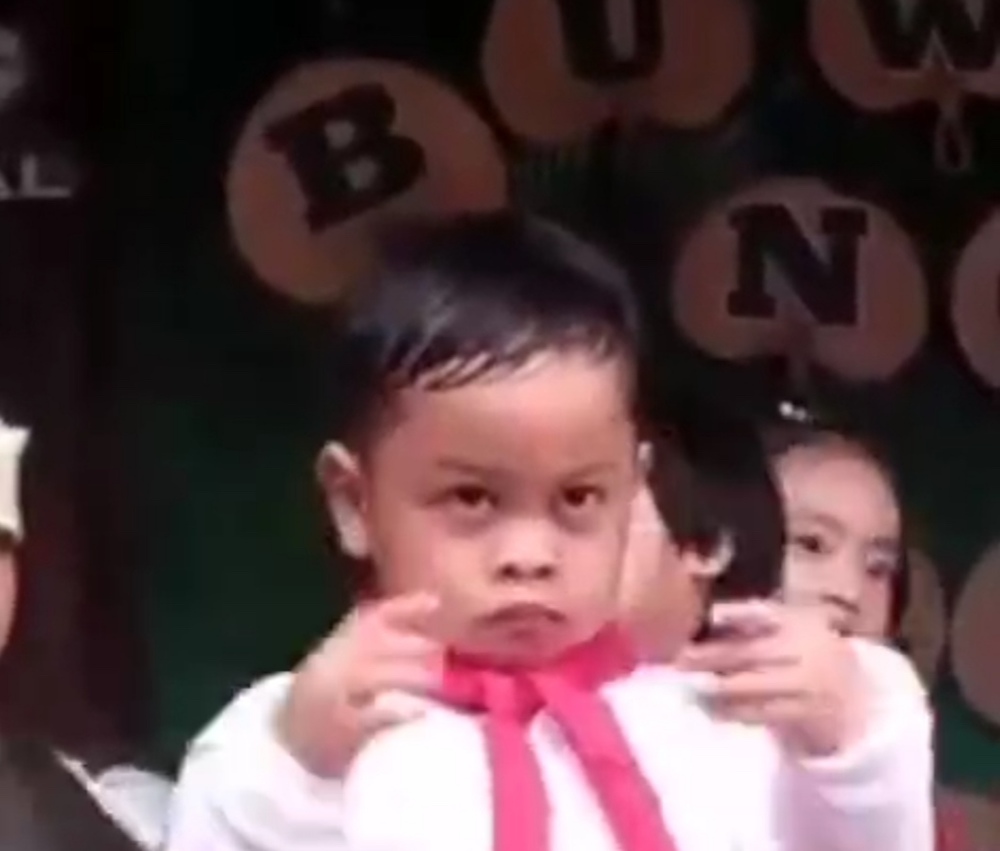 Screenshot of the boy performing without batting his eyelids. The boy has since become an internet sensation. u00e2u20acu201d Screengrab from Facebook/Hitz Sabah