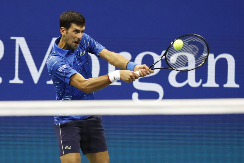 Novak Djokovic (pic) hits a backhand against Stan Wawrinka in the fourth round on day seven of the 2019 US Open tennis tournament in New York September 2, 2019. u00e2u20acu2022 Picture by Geoff Burke-USA TODAY Sports via Reuters