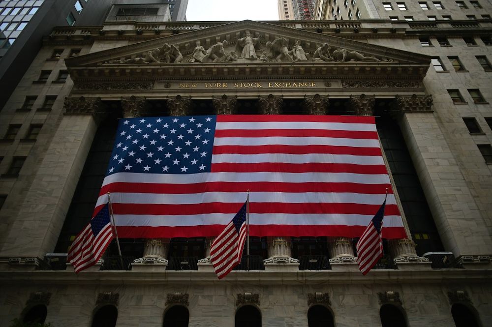 US flags are pictured outside the New York Stock Exchange (NYSE) on September 12, 2019. u00e2u20acu201d AFP pic