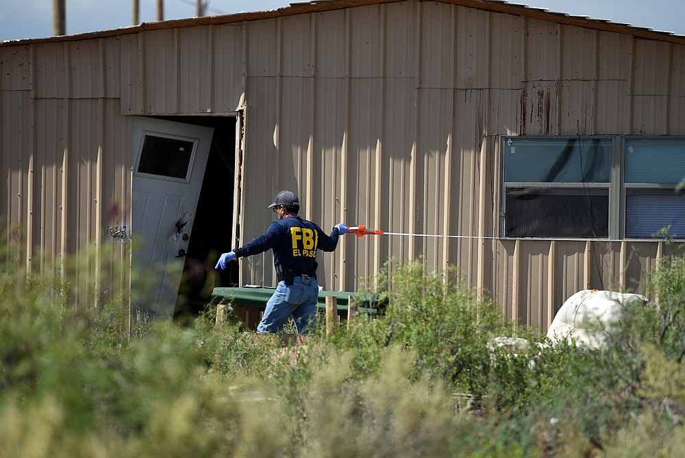 An FBI agent investigates the home of Seth Ator following the shooting he committed, according to the local police, in Odessa, Texas September 1, 2019. u00e2u20acu201d Reuters pic