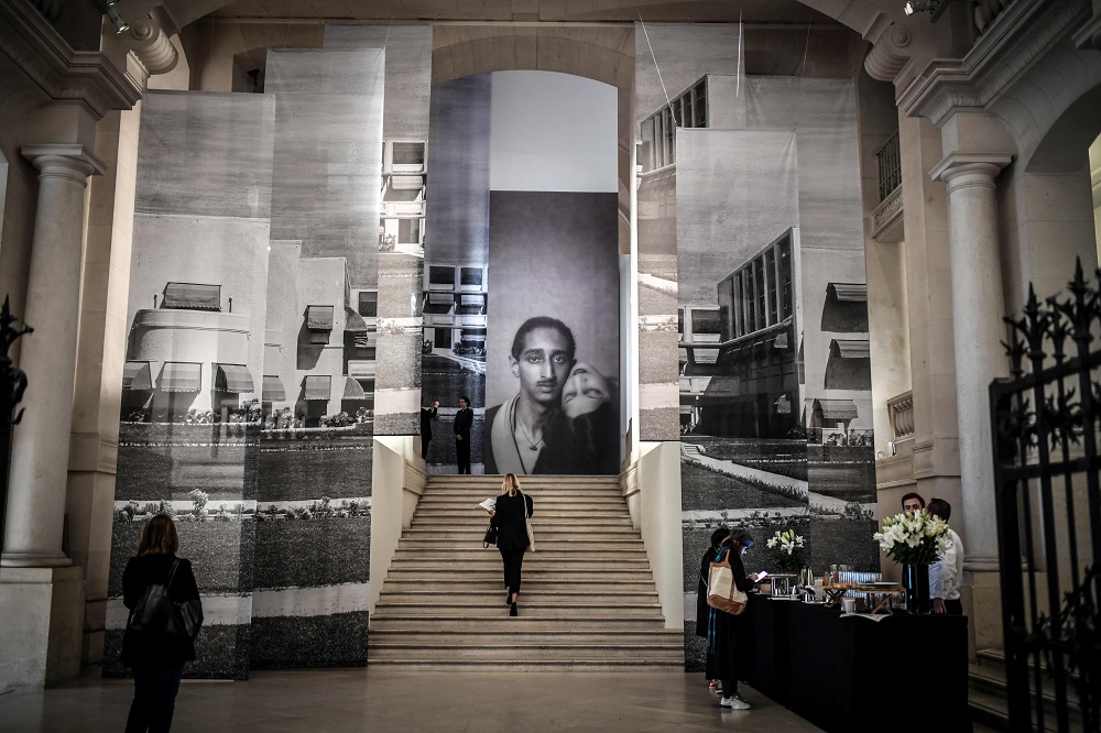 A visitor climbs the stairs as she arrives to view the opening of ‘The Modern Maharajah’ exhibition at the Museum of Decorative Arts in Paris September 25, 2019. — AFP pic