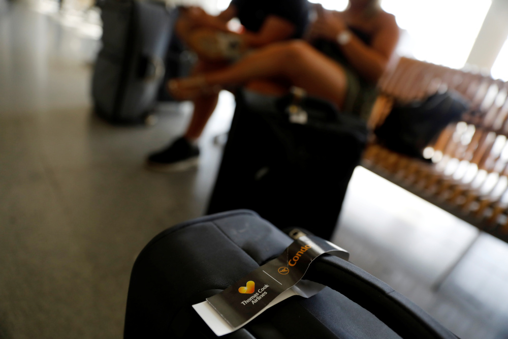 Passengers are seen at Dalaman Airport after Thomas Cook collapsed, stranding hundreds of thousands of holidaymakers around the globe and sparking the largest peacetime repatriation effort in British history, in Dalaman September 23, 2019. u00e2u20acu201d Reuters pic