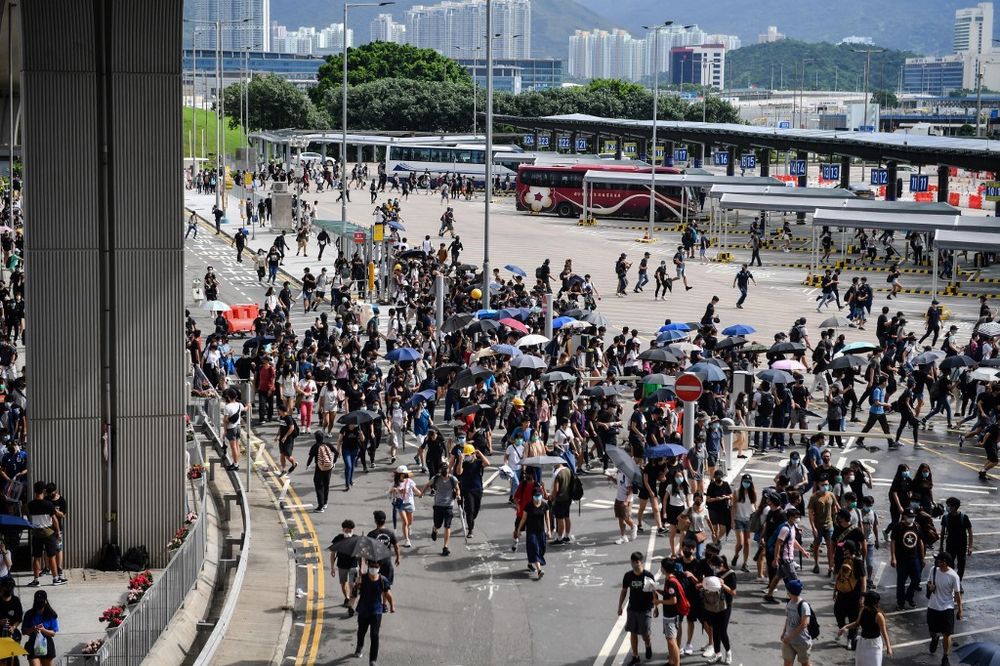 Protesters run from police at the bus terminal at Hong Kong International Airport on September 1, 2019. u00e2u20acu201d AFP pic