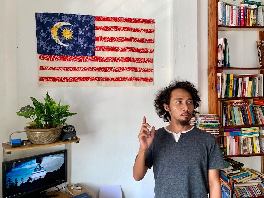 Rayhan Ahmad said the children are taught basic skills such as sewing and their latest project was the Jalur Gemilang for their Merdeka Day project. — Picture by Ben Tan