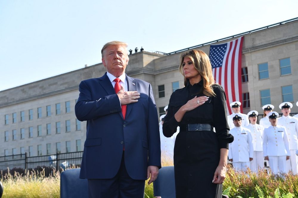 US President Donald Trump and First Lady Melania Trump listen to the national anthem during a ceremony marking the 18th anniversary of the 9/11 attacks, on September 11, 2019, at the Pentagon in Washington DC. u00e2u20acu201d AFP pic