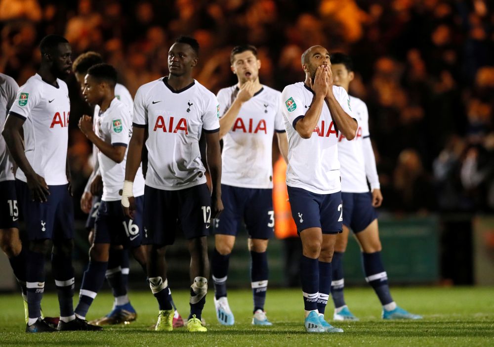 Tottenham Hotspur players react after losing the penalty shootout against Colchester United. u00e2u20acu201d Reuters pic